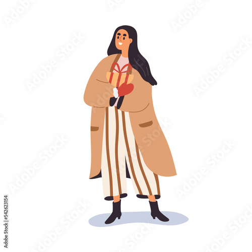 Happy woman holding Christmas gift box. Young girl with Xmas, winter holiday ...