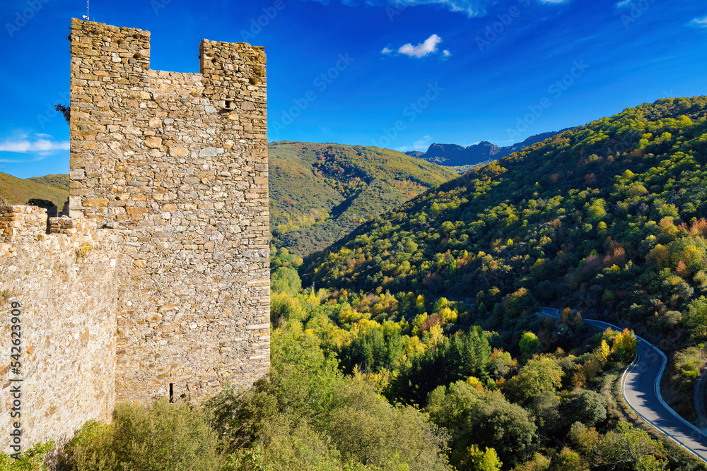 High mountains surround the walls of the castle of Cornatel, Castilla y Léon, Spain