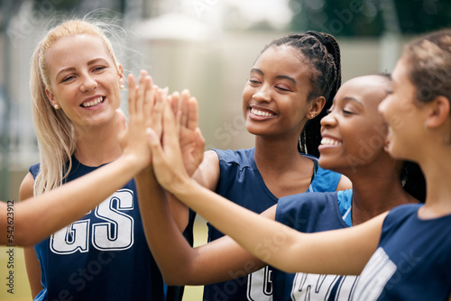 Fotografie Sports women, netball team or high five hands in success, support or motivation on court training game, workout match or exercise