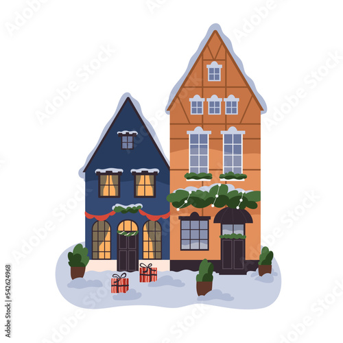 Town buildings exteriors decorated with festive Christmas decor. Europe city ...