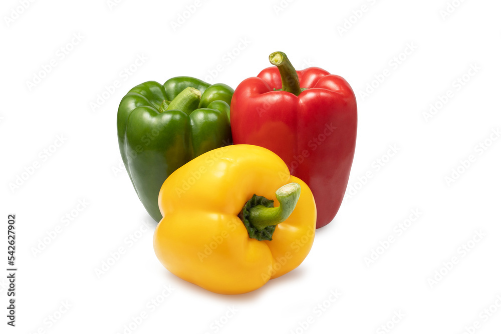 a group of three colored sweet peppers on a white a group of three colored sweet peppers on a white