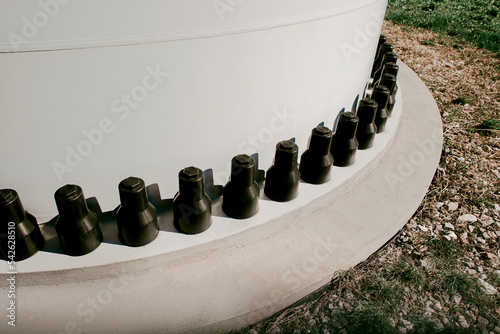 Industrial bolts on a wind turbine base photo