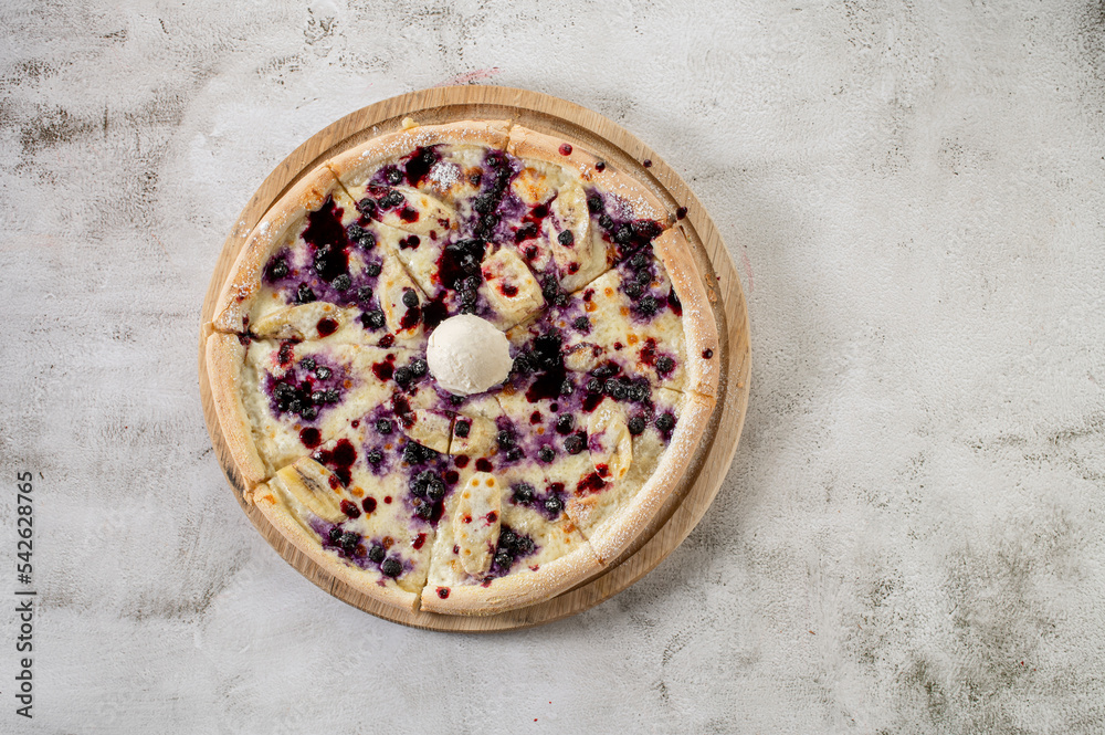Strudel pizza with apples and ice cream. Flat lay Strudel pizza with apples and ice cream. Flat lay