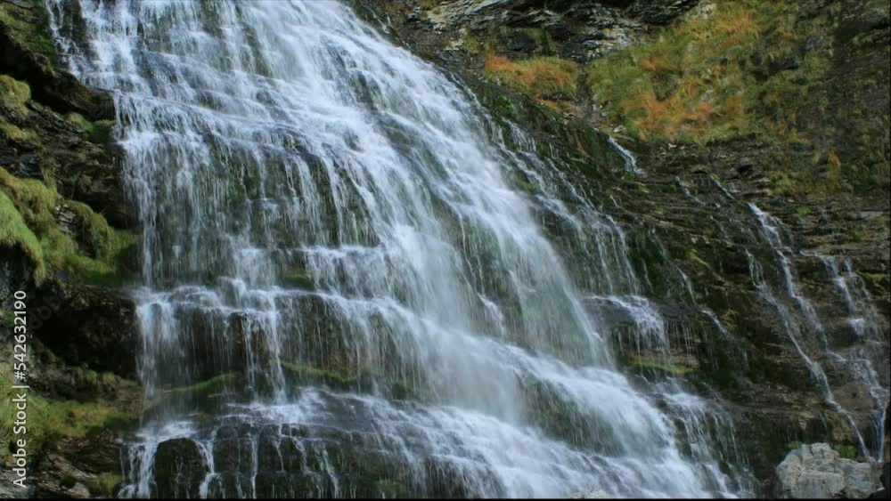 Spectacular view of the Cola de Caballo waterfall in the Ordesa y Monte Perdido National Park in Huesca, Aragon, Spain