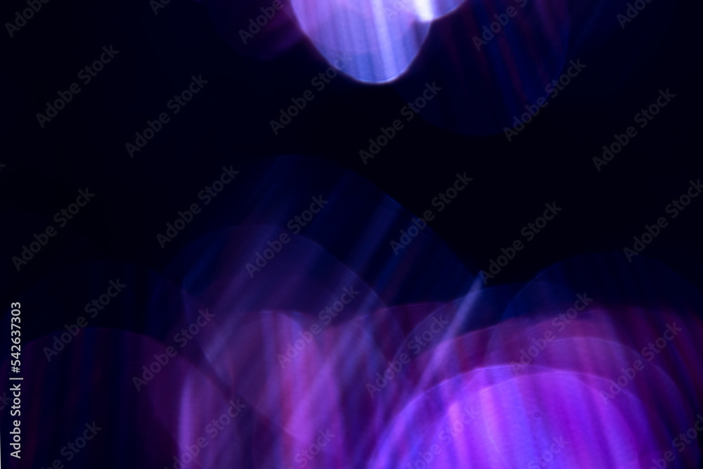 Blur purple rainbow crystal light leaks on black background. Defocused abstract multicolored retro film lens flare bokeh analog photo overlay or screen filter effect. Glow Vintage prism colors