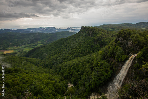 Spring sunset in Salt De Coromina waterfall, La Garrotxa, Spain photo