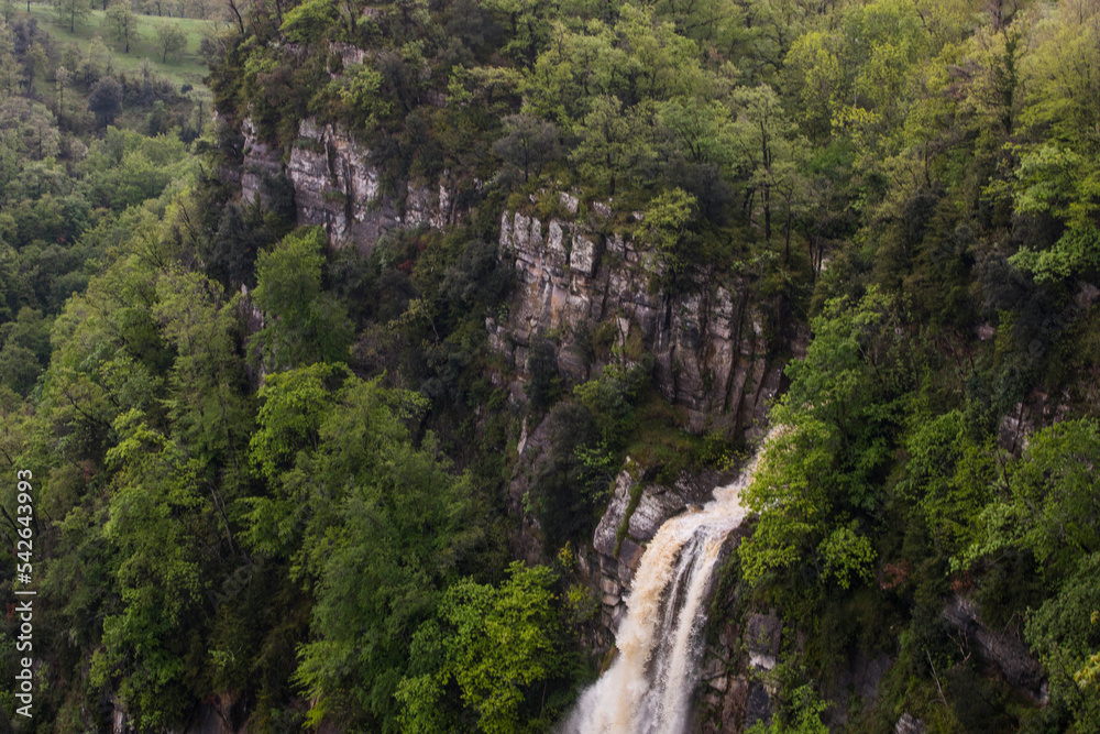 Spring sunset in Salt De Coromina waterfall, La Garrotxa, Spain