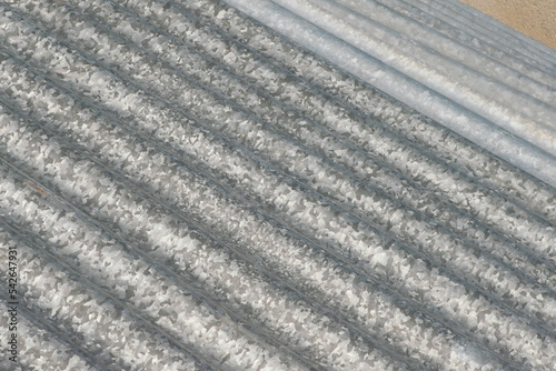 roof architecture: building with galvanized sheet metal canopy, durable and resistant easy to assemble. metal corrugations today revalued for modern buildings.