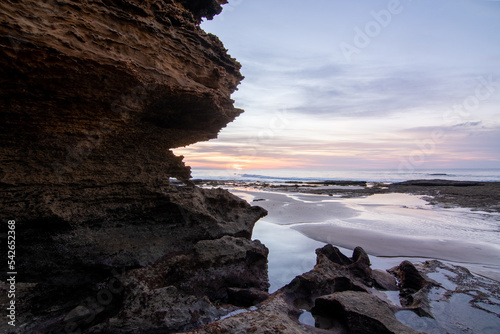 rock formations on the beach photo
