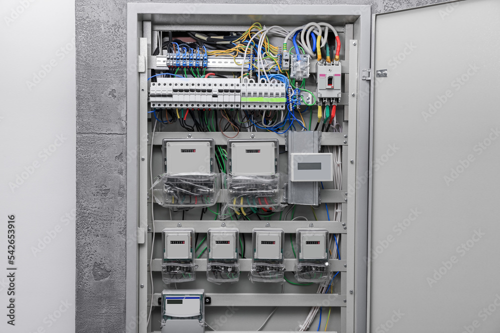 Fuse box with many electric meters and wires