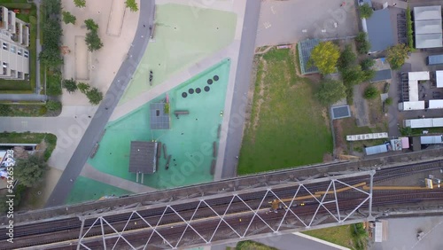 vertical Park at railroad bridge big city. Great aerial view flight berlin photo