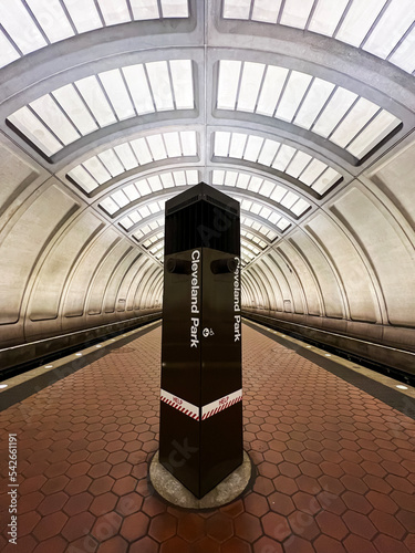 The Cleveland Park Metro Station platform tunnel, with no people visible, in Washington, DC. The station is part of the Washington metro area transit authority system (WMATA) photo