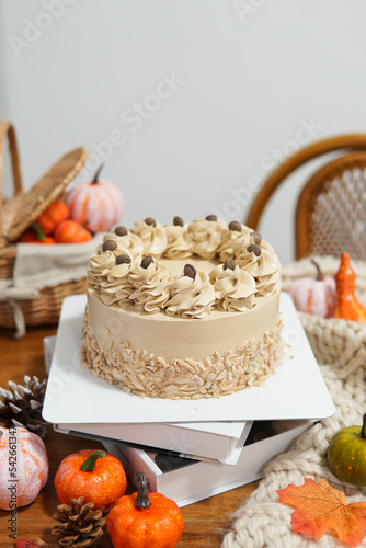 Delicious coffee cake on wood table.