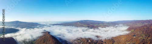 Panoramic landscape of the Sovata resort area - Romania seen from above in autumn with fog in the valley