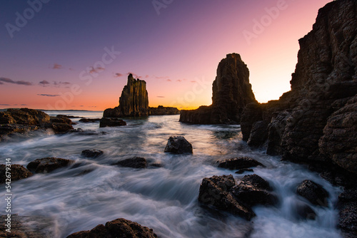 Sunrise glow at Cathedral Rocks, Kiama, Australia.