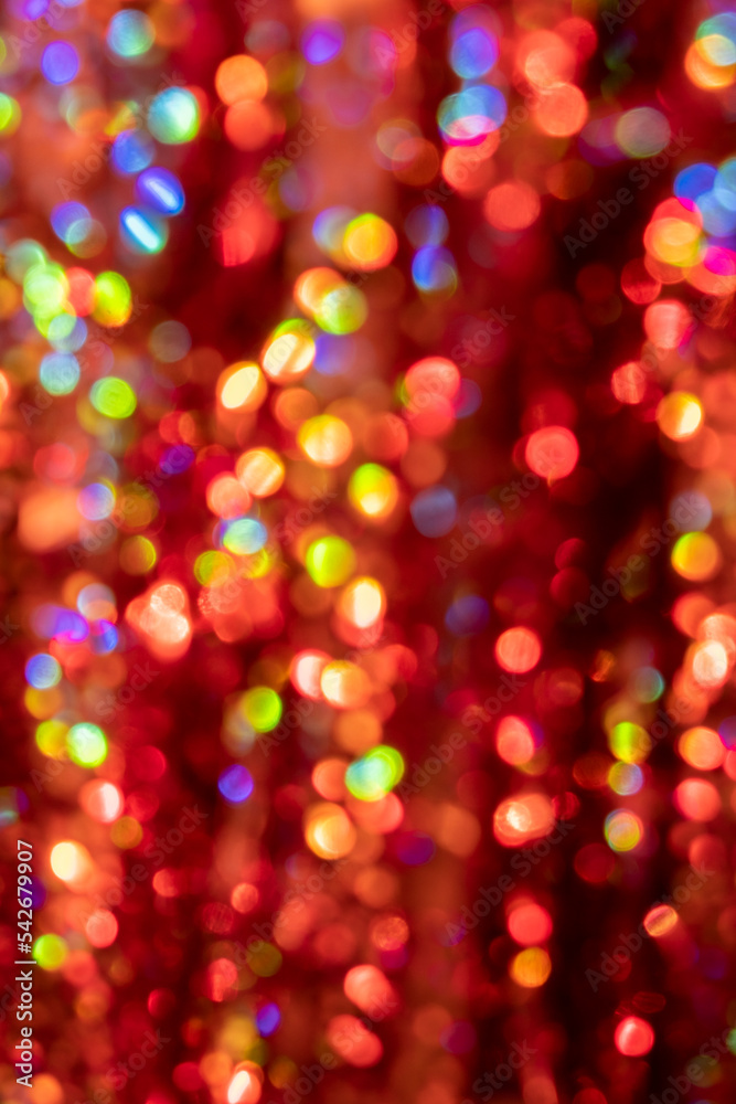 Vertical New Year Christmas background with colorful bright bokeh