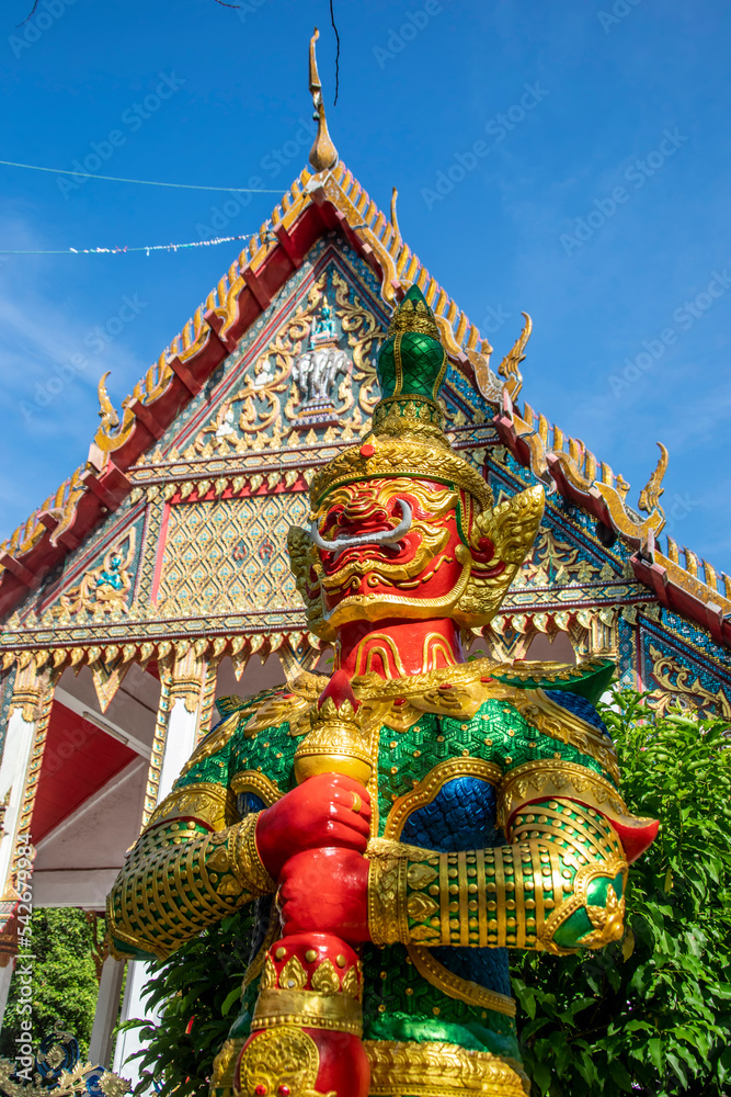 the Yaksha statue in front of  Wat Pho Bang Khla in Chachoengsao, Thailand. The temple known more for its bats (Lyle's flying fox, Pteropus lylei ) than its Buddhas.