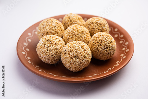 Amaranth laddu or Rajgira laddoo made using royal grain also called cholai spherical sweet balls photo
