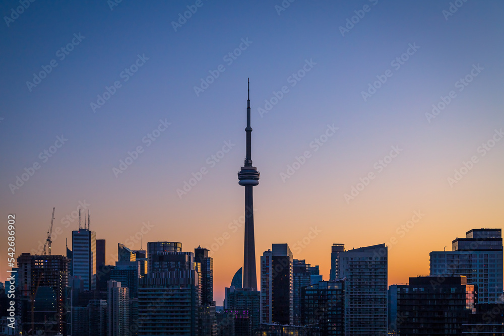 Silhouette of Toronto skyscraper with beautiful sunset colors as background 
