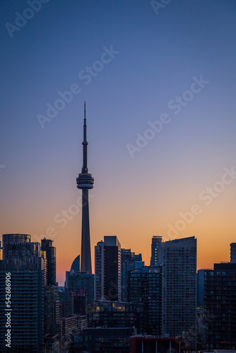 Silhouette of Toronto skyscraper with beautiful sunset colors as background 