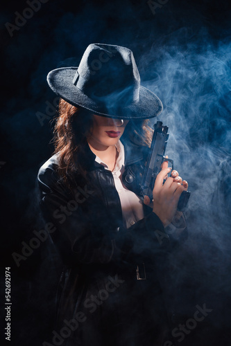 Silhouette: a female detective in a coat and hat with a gun in her hands. Dramatic noir portrait in the style of books and detective films of the 1950s.