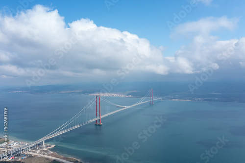 Aerial view of Hellespont and new made 1915 canakkale bridge and high way with white clouds and ships on the sea photo