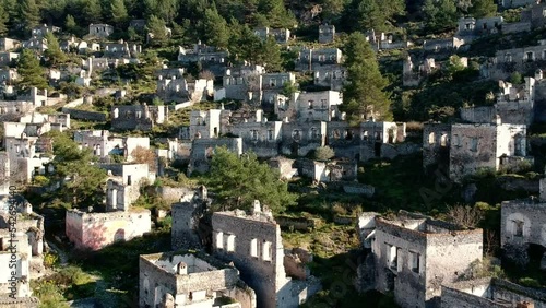 Kayakoy Abandoned ghost town, stone houses and ruins. The site of the 18th century Ancient Greek city of Karmilissos. Fethiye - TURKEY photo