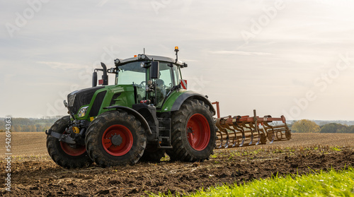 Tractor working on the land