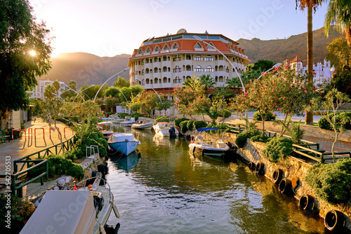 Fototapeta Naklejka Na Ścianę i Meble -  Sunset and river in the city of Icmeler in Turkey