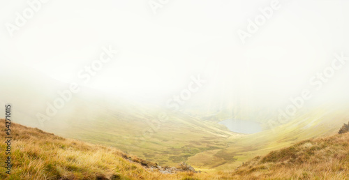 Amazing view in the national park Lake District in England on a foggy day in Autumn