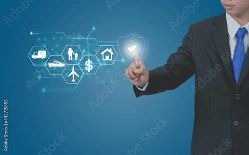 Insurance concept with options on the virtual screen, Businessman choose options insurance icons, car, travel, family and life, financial and health insurance savings