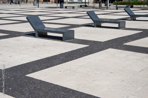Wroclaw square lined with concrete elements and benches. Summer. © W Korczewski