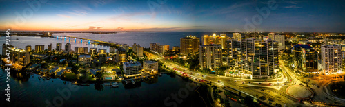 Φωτογραφία Sarasota aerial blue hour with city and Ringling bridge lit up.
