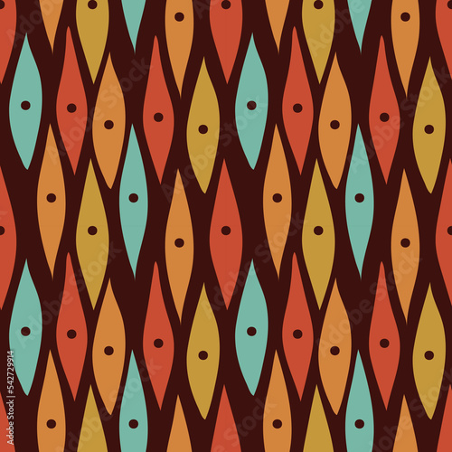 Groovy seamless pattern. Seamless abstract pattern in vintage 70s style in orange and brown for a fabric or paper print.