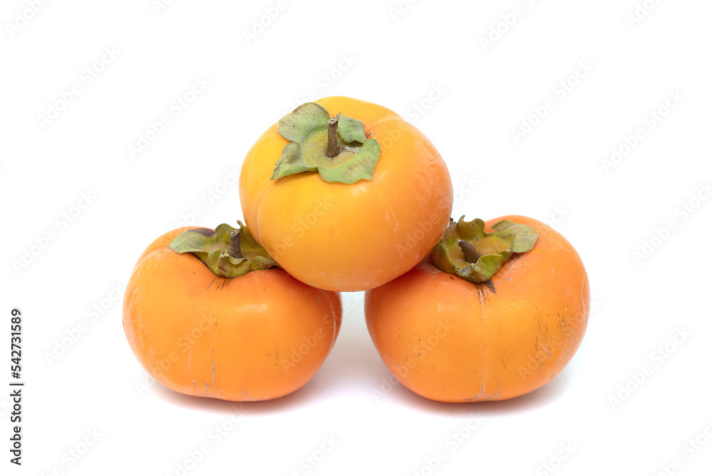 Yellow persimmon isolated on white background. Yellow persimmon isolated on white background.