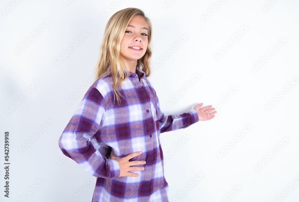 beautiful caucasian teen girl wearing plaid purple shirt over white wall feeling happy and cheerful, smiling and welcoming you, inviting you in with a friendly gesture beautiful caucasian teen girl wearing plaid purple shirt over white wall feeling happy and cheerful, smiling and welcoming you, inviting you in with a friendly gesture