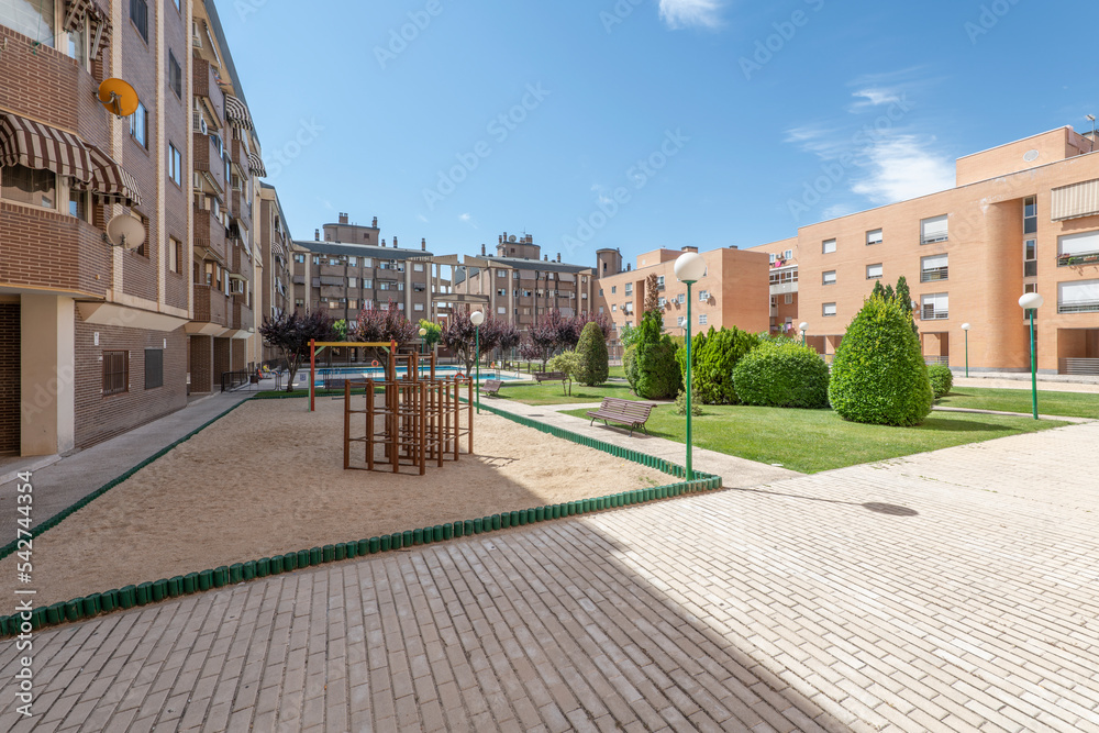 Garden, recreation area and games within a residential housing development