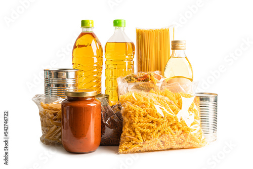Foodstuff for donation, storage and delivery. Various food, pasta, cooking oil and canned food in cardboard box.