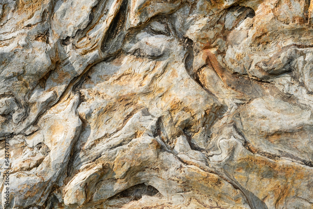 Rough embossed stone surface texture - background Rough embossed stone surface texture - background