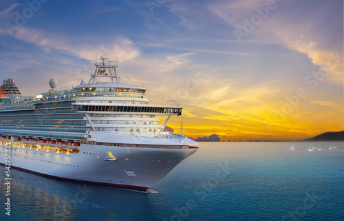 Luxury cruise ship sailing to port on sunrise  © NAN