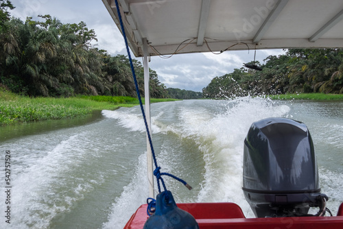 Motora navegando por el canal de Tortuguero,  Costa Rica photo