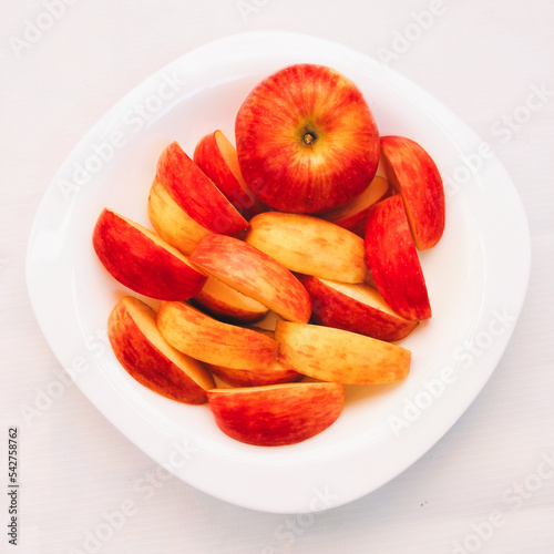 Apples fruit fresh red apple ripe juicyapples whole and sliced in a plate food malus domestica, seb, apel, apfel, Manzana, La Pomme, tafaha, yabloko, ringo no mi, la mela, ping guo, closeup image view photo