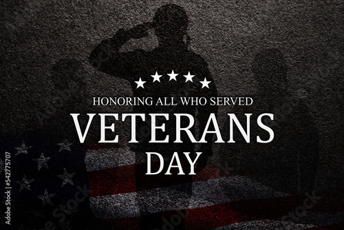 Silhouettes of soldiers saluting with text Veterans Day Honoring All Who Served on black textured background. American holiday typography poster. Banner, flyer, sticker, greeting card, postcard.
