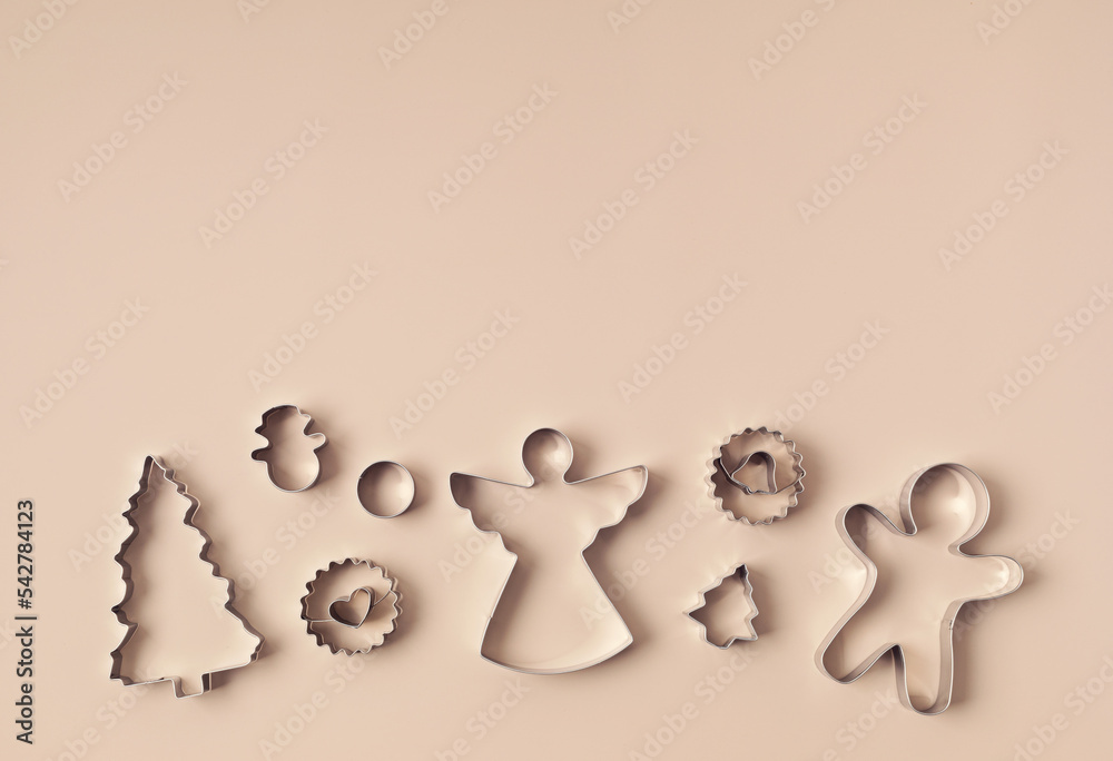 Christmas cookie cutters background. Festive baking, xmas homemade
