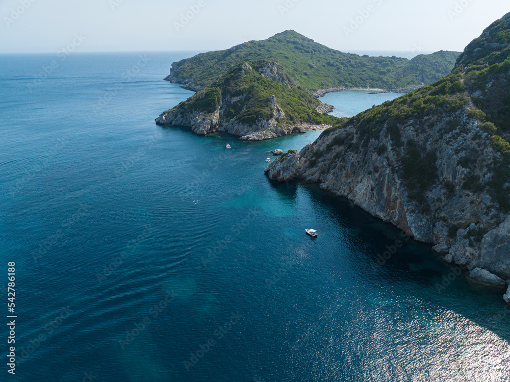 Aerial view of the coastline that lead to Porto Timoni beach, Corfu island, Greece. Thin strip that forms two beaches bathed by crystal clear waters