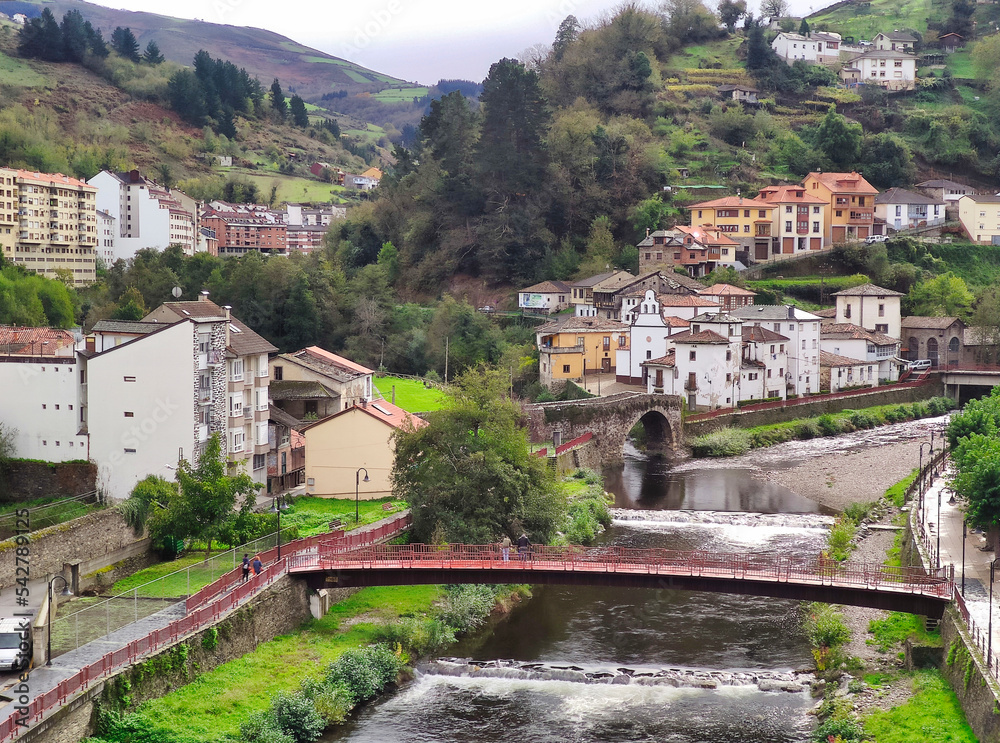 Cangas del Narcea, El Cascarin district where is El Carmen chapel and the roman bridge next to Narcea river, Asturias, Spain