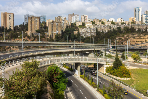 HAIFA, ISRAEL - September 29, 2022: Highway interchange with traffic on multiple levels, Aerial image.