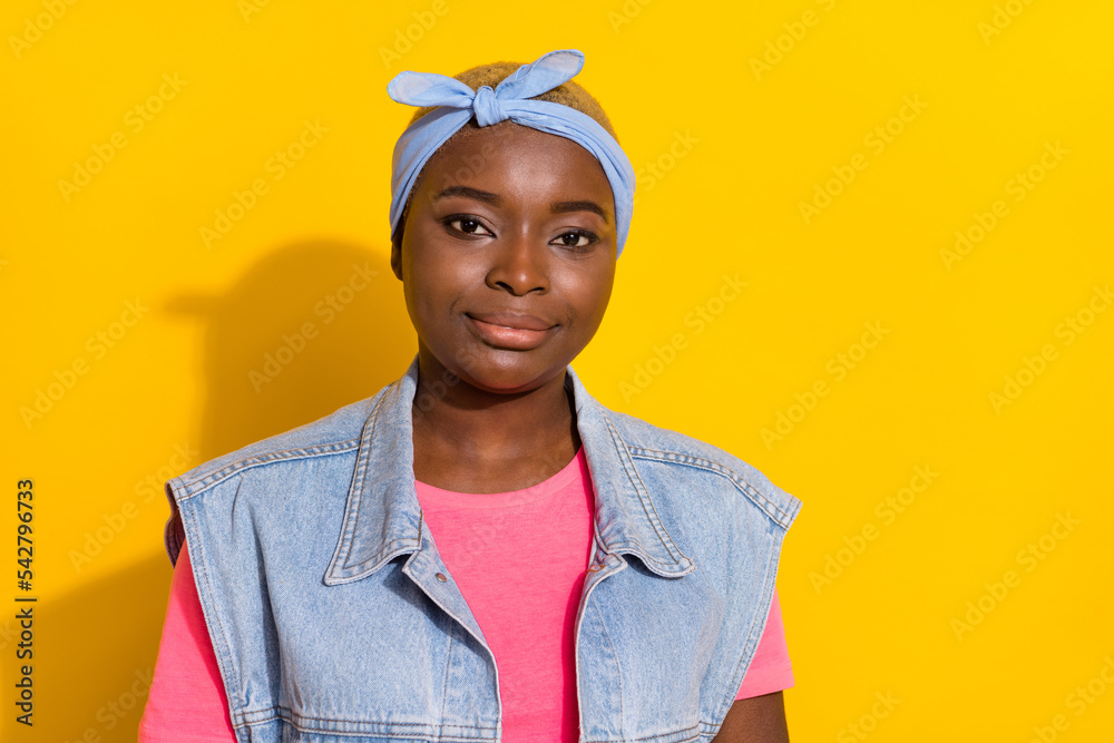 Photo of calm nice person look camera isolated on bright yellow color background Photo of calm nice person look camera isolated on bright yellow color background