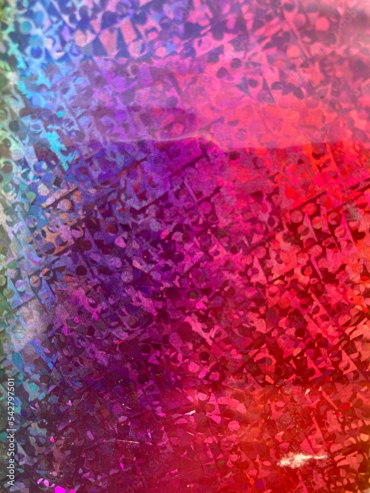 A colorful glittery surface closeup