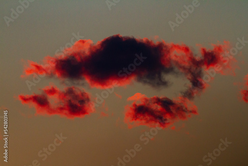 red and dark cloud details taken in backlight at sunset